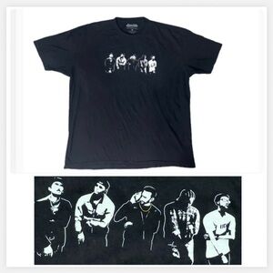 Designs By Human’s Classic Black Graphic Tee. Short Sleeves Crew neck